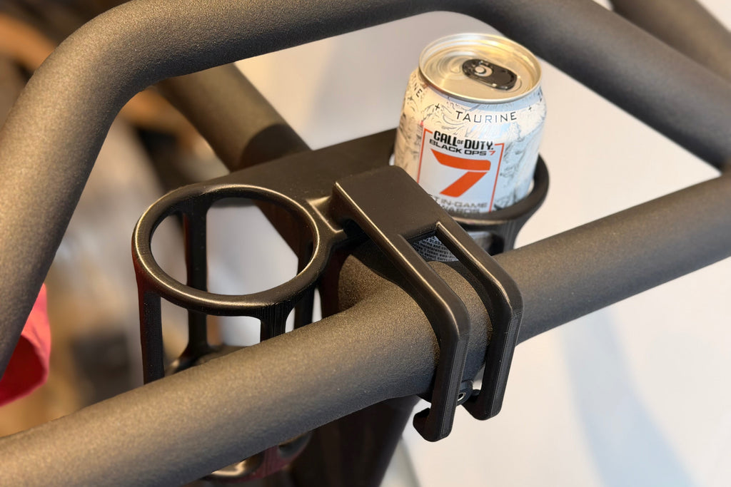 Dual drink can holders for Peloton Bike+