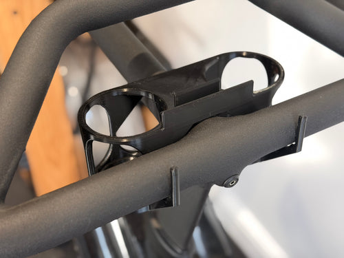 Dual drink can holders for Peloton Bike+