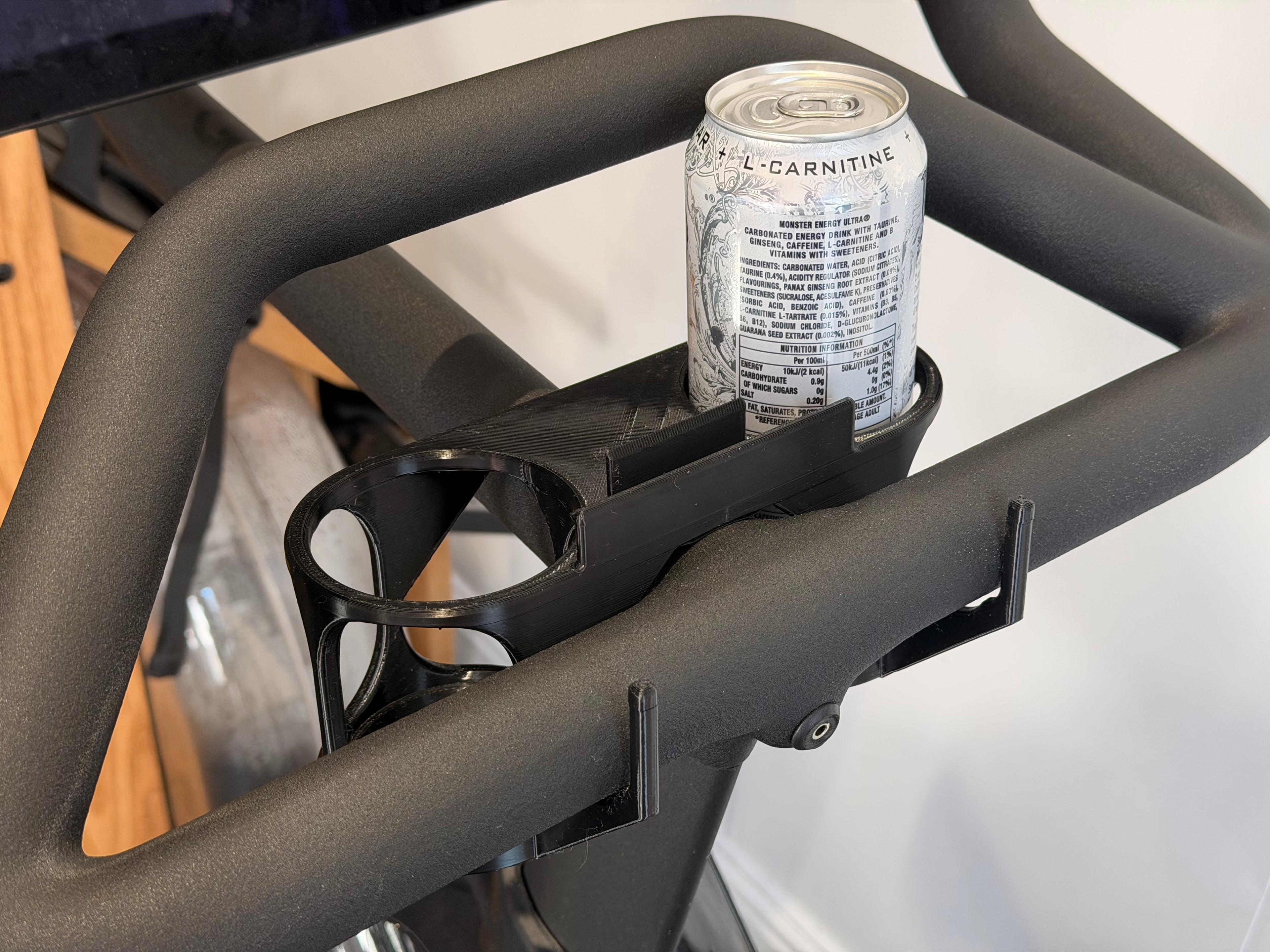 Dual drink can holders for Peloton Bike+