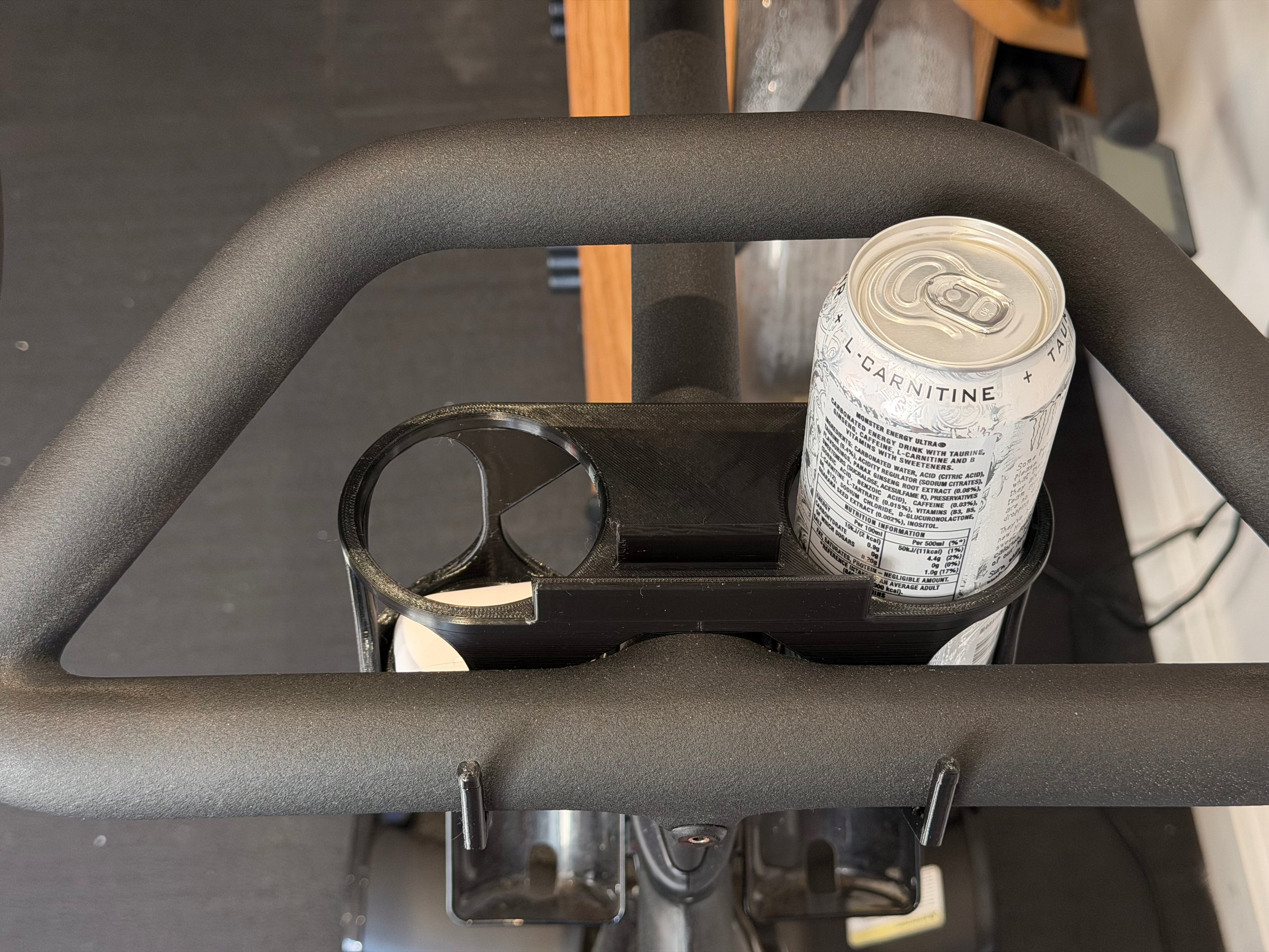 Dual drink can holders for Peloton Bike+